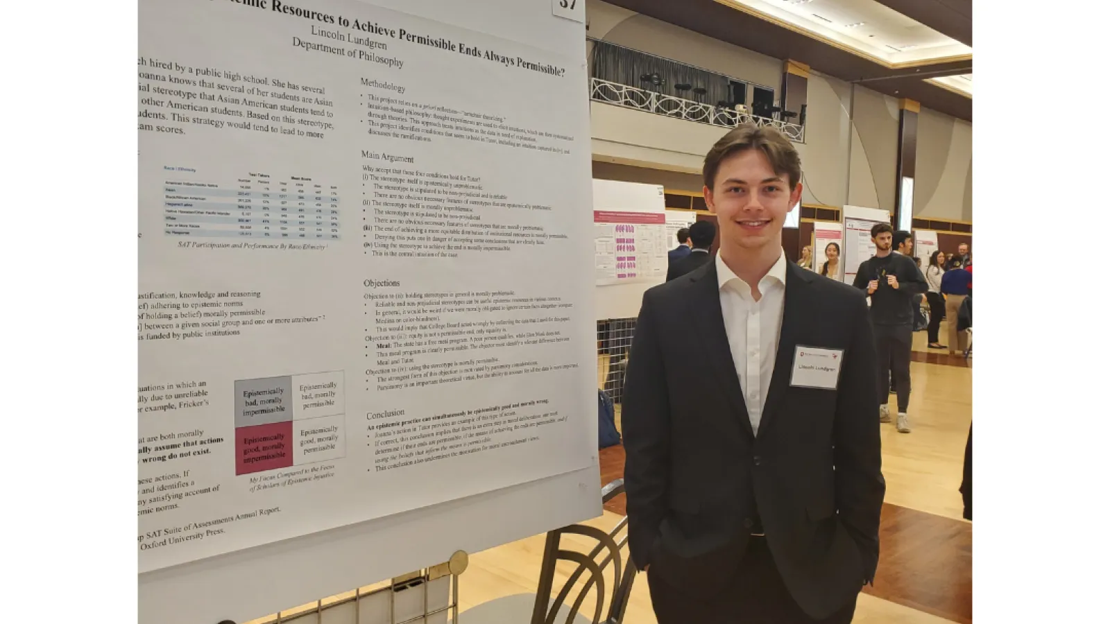 Lincoln Lundgren standing next to his display.